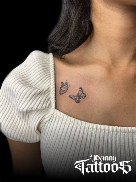 collar bone small butterfly tattoo on chest|15 Small Butterfly Tattoo Designs for the Chest